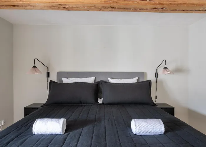 City Apartment With Exposed Ceiling Beams Copenhagen, Denmark